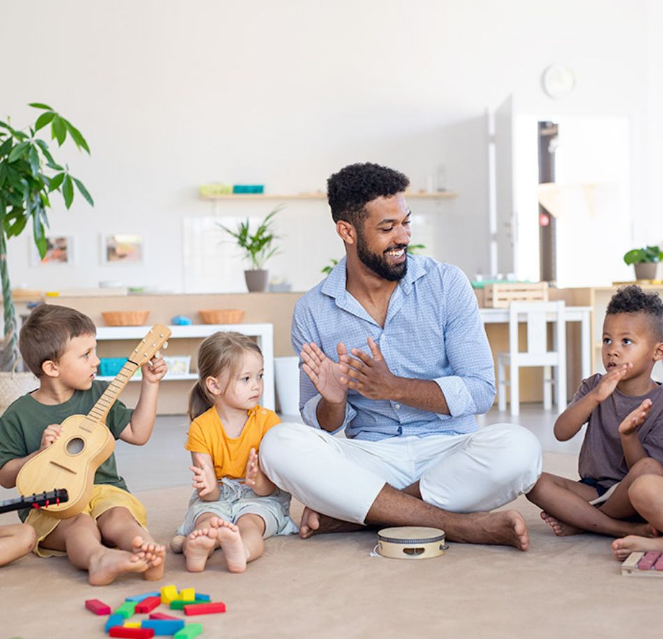 A Black male singing alone in a daycare